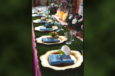 close up of place setting with green runner